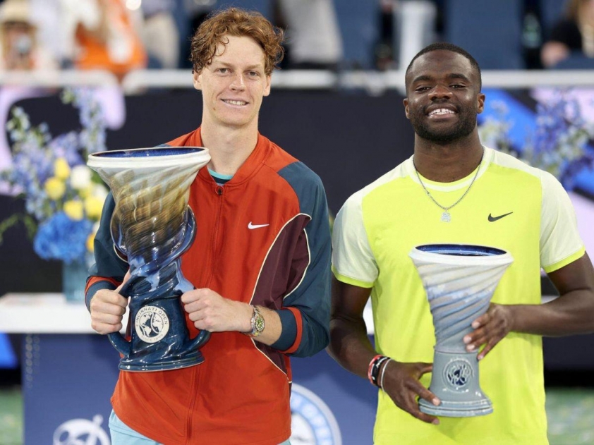 Hình ảnh Jannik Sinner và Frances Tiafoe